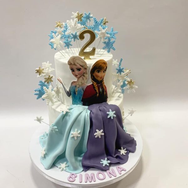 Torta za devojčice Dečija torta za devojčice na 2 sprata sa motivima animiranog filma Frozen.Poklondzija