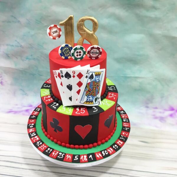 Torta za 18 rodjendan na 2 sprata sa motivima kockarnice.Poklondzija