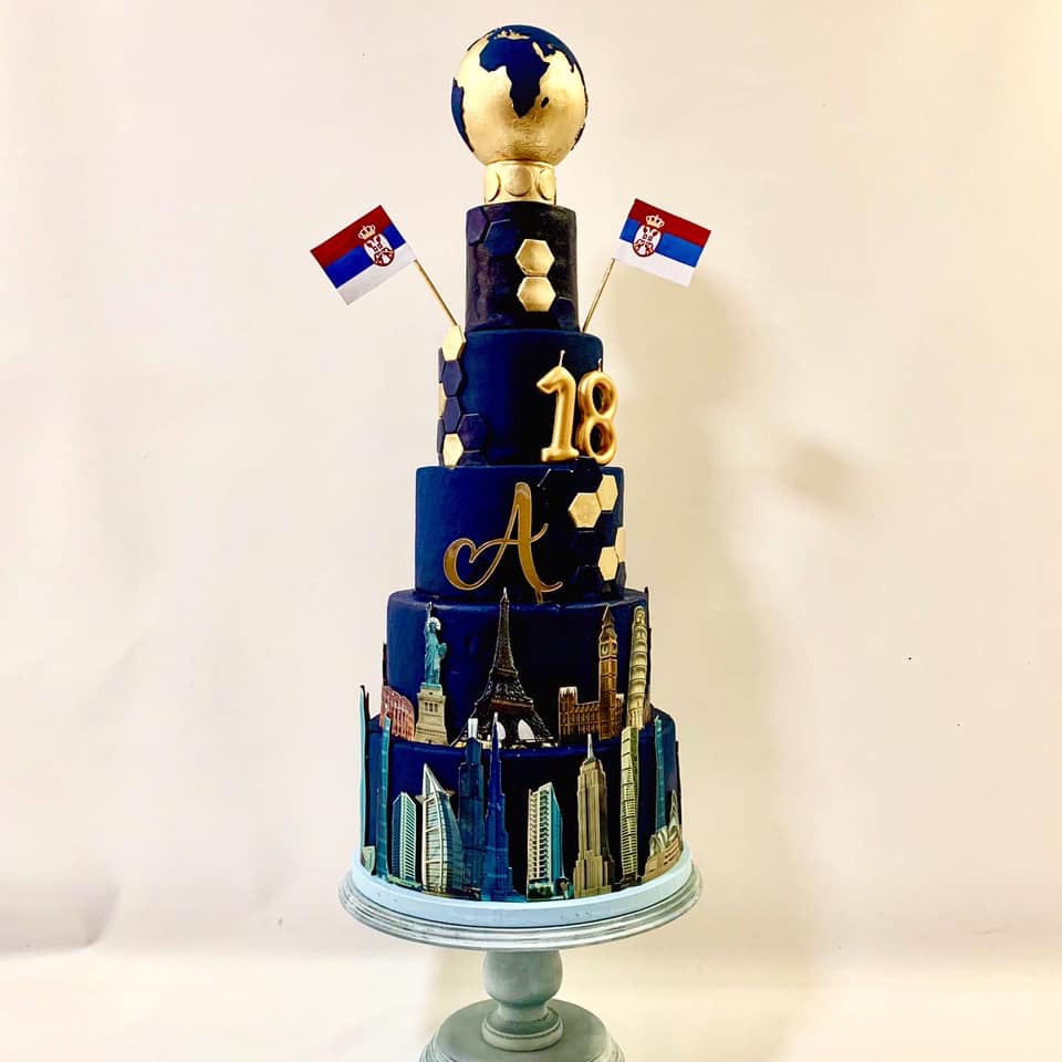 Torta za 18 rodjendan na 5 spratova u teget zlatnoj kombinaciji sa motivima Sveta i zlatnim brojem 18.Poklondzija